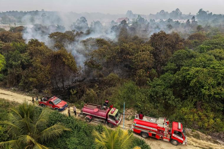 Indonesia conducts water bombing to contain wildfires near future capital Nusantara