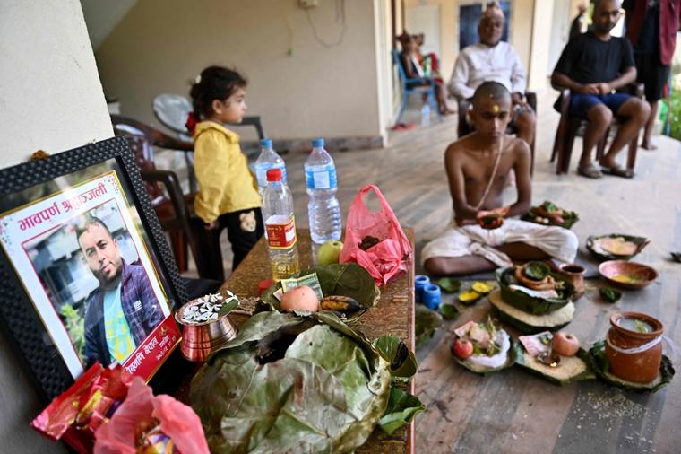Nepal holds day of mourning as families pray missing still alive