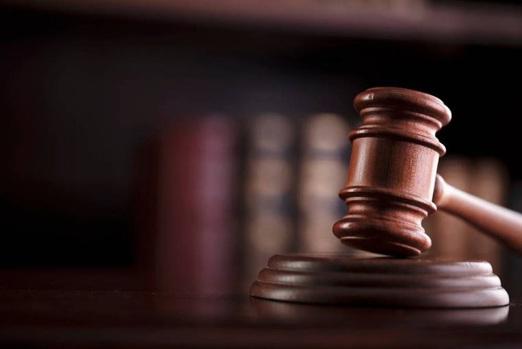 Two brothers among four men charged with murdering man in oil palm plantation